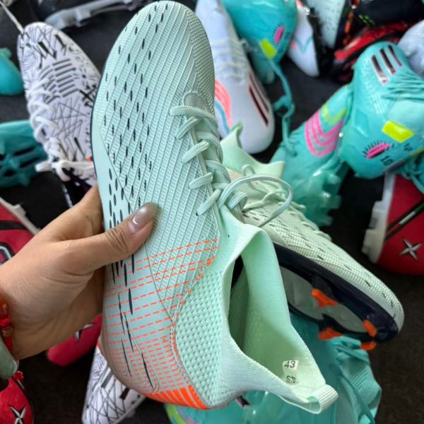 微信图片_20260112140611_607_12 Wholesale Chinese Branded New Stock Soccer Cleats Shoes Comfortable Upper Second Hand Unisex